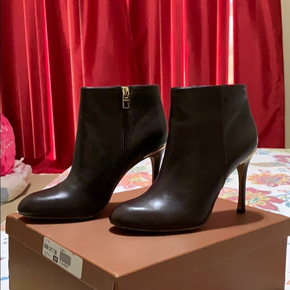 Authentic coach ankle boots/new